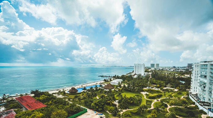 An aerial view of hotels and coastline in Cancún