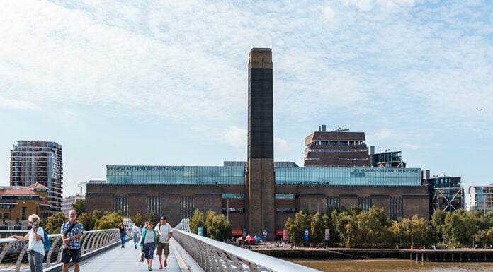 A bridge across the Thames leading to the Tate Modern museum in London