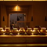 A line of clay pots in Oaxacan restaurant Tierra del Sol