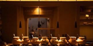 A line of clay pots in Oaxacan restaurant Tierra del Sol