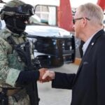 Ambassador to Mexico Ron Johnson shaking the hand of a Mexican soldier