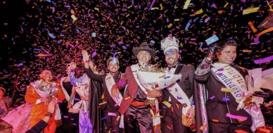 A group, dressed as royalty, celebrating Mazatlán's carnival
