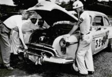 Hershel McGriff oversees repairs on his “City of Roses” Oldsmobile during the first running of the Carrera Panamericana in Mexico in 1950. (NASCAR Hall of Fame)