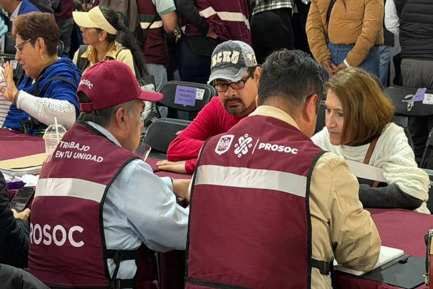 Government representatives from PROSOC assist residents understand their rights under Mexican law at community service event in Mexico City