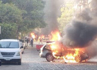 a burning car as a roadblock in puerto vallarta