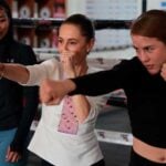 Sheinbaum practicing a boxing pose