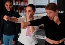 Sheinbaum practicing a boxing pose