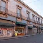 Mexico City, Mexico – August 15, 2020: Empty streets while the Covid pandemic took on the city and posters warning people to stay inside their houses