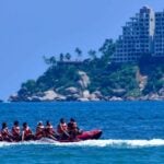 Tourists on a boat ride in Acapulco, Guerrero, Mexico