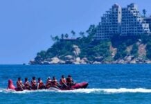 Tourists on a boat ride in Acapulco, Guerrero, Mexico