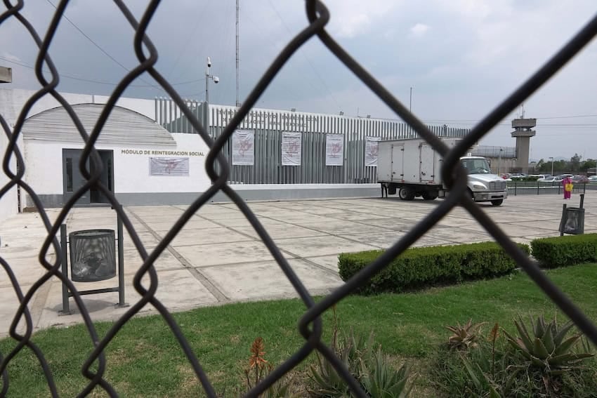 prison thru chain-link fence