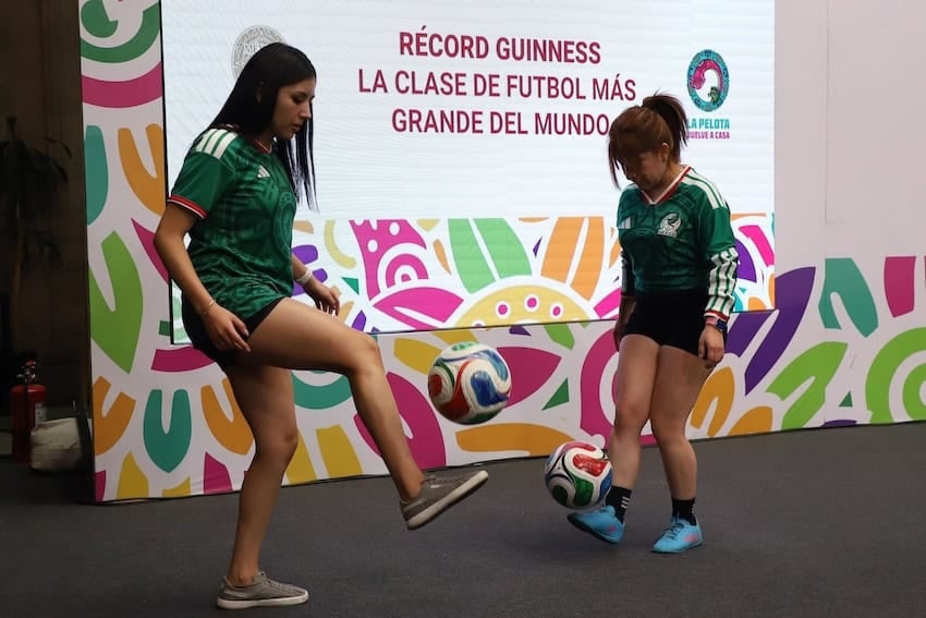 women practicin soccer