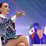 Mexico's Business Advisory Council chief Altagracia Gómez speaks into a microphone