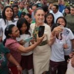 Sheinbaum walking among people