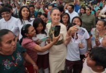 Sheinbaum walking among people