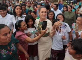 Sheinbaum walking among people