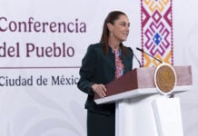 President Sheinbaum at the podium of her morning press conference