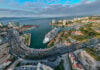 An aerial fisheye view of a massive cruise ship at dock in Puerto Vallarta
