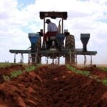 Farmer on tractor in Mexico