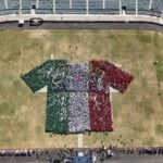aerial view of a giant human-formed soccer jersey