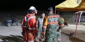 rescue workers at mine site