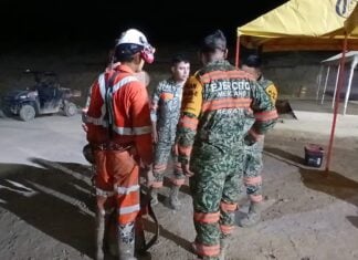 rescue workers at mine site