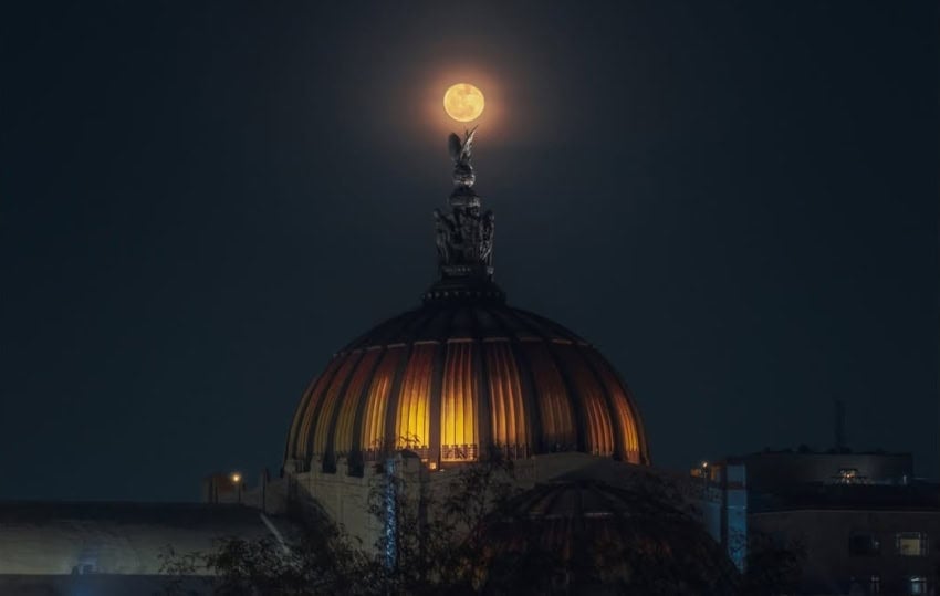 Full moon over Bellas Artes in Mexico City