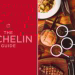 An image of the Michelin Guide logo next to a spread of food on a restaurant table