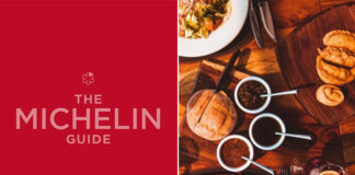 An image of the Michelin Guide logo next to a spread of food on a restaurant table