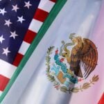 Flags of Mexico and the U.S. shown at a civic event