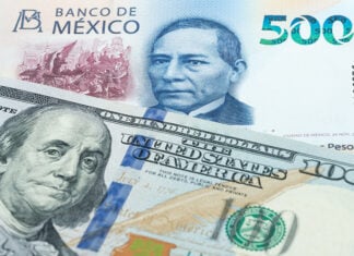 A 100-US dollar bill and a 500-Mexican peso bill