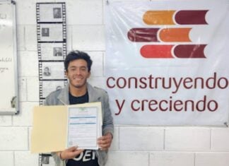 Construction worker with educational materials