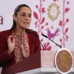 Sheinbaum at podium on April 7, 2026