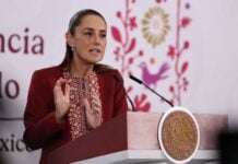 Sheinbaum at podium on April 7, 2026