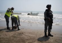 oil spill cleanup on Gulf beach