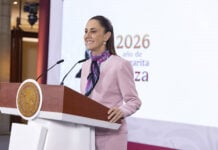 President Claudia Sheinbaum at the podium of her morning press conference