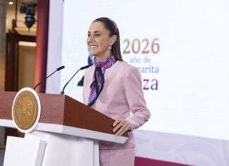 President Claudia Sheinbaum at the podium of her morning press conference