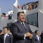 Nassón Joaquín García, shown here welcoming guests from 54 countries to a convicatiuon of his