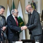 Mexico's Health Minister David Kershenobich shakes hands with colleagues during a work trip to Brazil