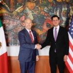 Ambassador Johnson shaking hands with Foreign Affairs Minister of Mexico Roberto Velasco