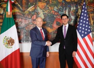 Ambassador Johnson shaking hands with Foreign Affairs Minister of Mexico Roberto Velasco