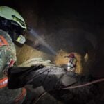 Twenty-four other miners were working inside the mine at the time, but four — Beltrán among them — were too deep inside to escape. Two of the trapped miners were rescued alive.
