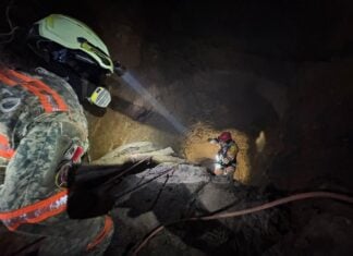 Twenty-four other miners were working inside the mine at the time, but four — Beltrán among them — were too deep inside to escape. Two of the trapped miners were rescued alive.