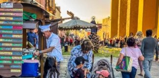 Children and adults at an ice cream stand in San Miguel de Allende