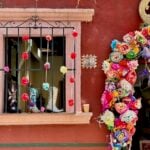 A doorway in San Miguel de Allende filled with flowers.