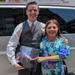 Mexico City Mayor Clara Brugada and actor Pedro Pascal pose with an axolotl figurine