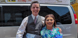 Mexico City Mayor Clara Brugada and actor Pedro Pascal pose with an axolotl figurine