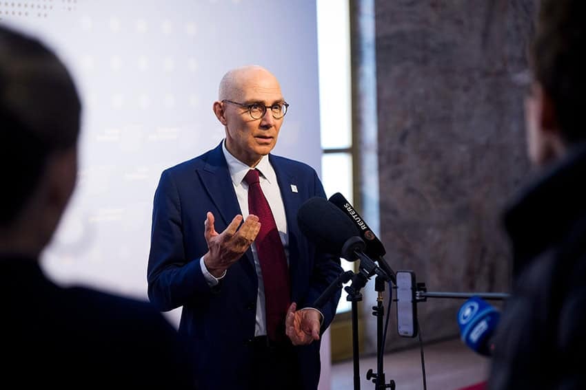 UN High Commissioner for Human Rights Volker Türk speaks at a microphone