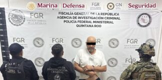 Remigio Valdez, known as "Milo" in handcuffs