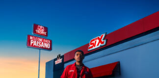 Welcome Back Paisano campaign image with a Mexican worker posing in front of a SIX store
